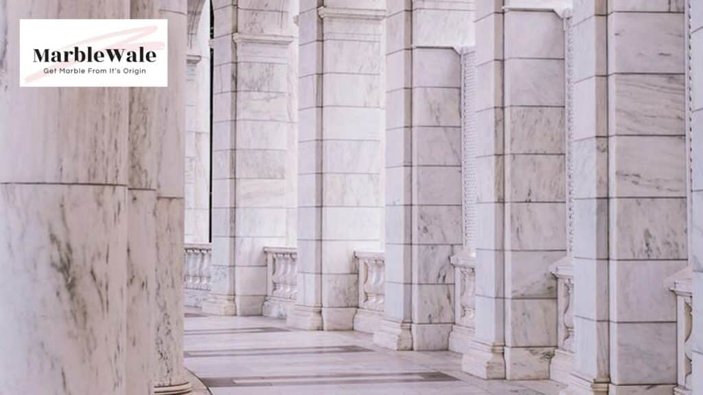 "Classic white marble columns in a grand hallway"